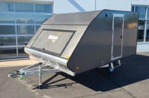 front 3/4 view of charcoal crossover snowmobile trailer