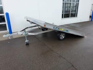 front view of Tilt Bed Snowmobile Trailer in ramp position